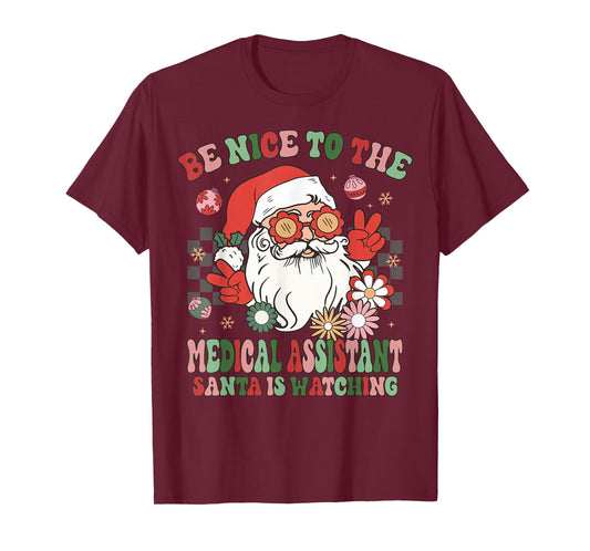 Christmas Be Nice To The Medical Assistant Santa Is Watching T-Shirt